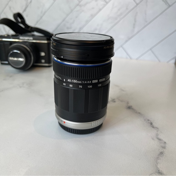 Olympus PEN E-P3 Mirrorless Digital Camera with Accessories and 2 Zoom Lenses - Picture 9 of 16